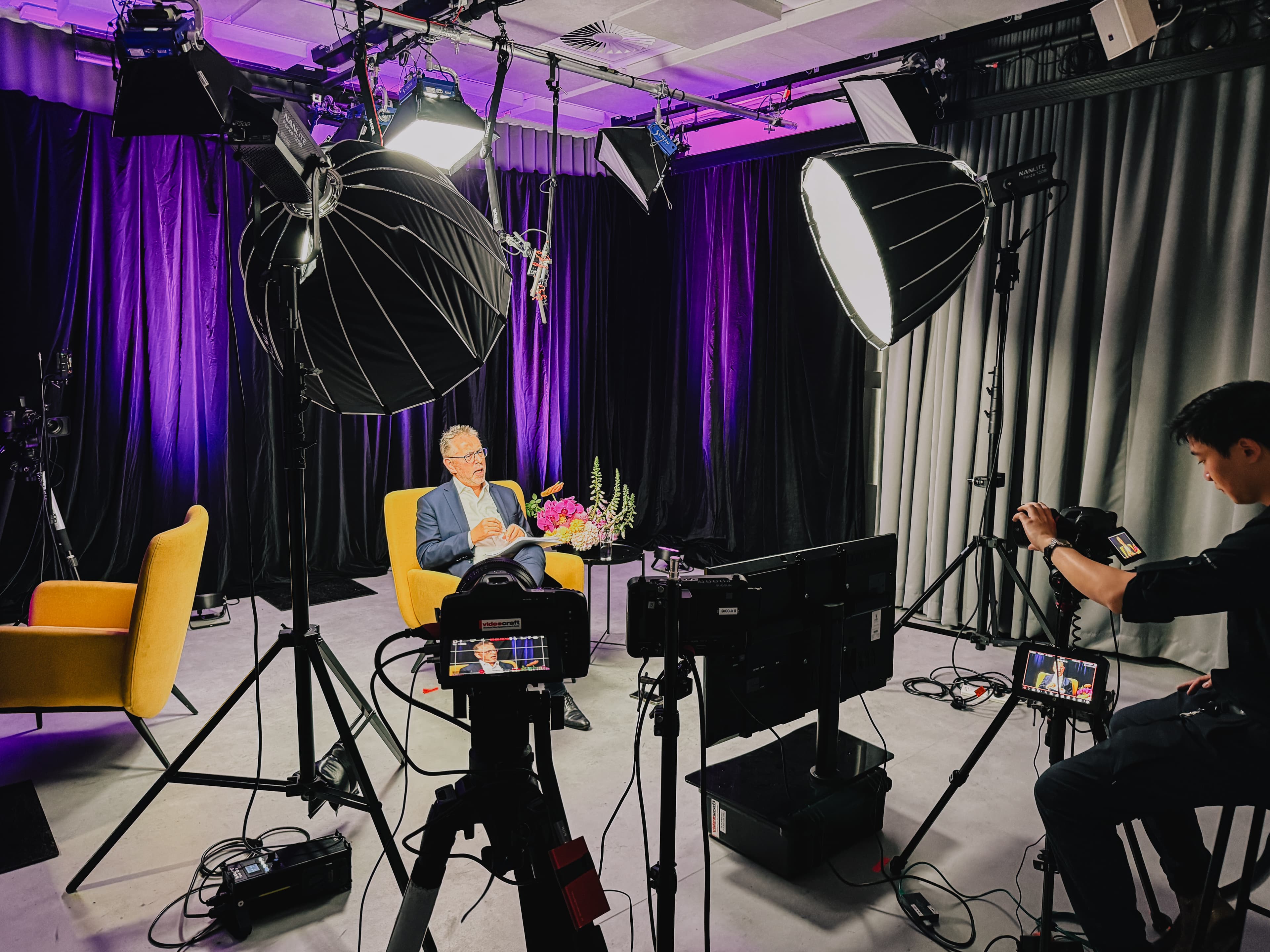 Control room setup used for live streaming and hybrid event delivery.